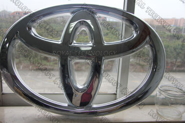 Vácuo automotivo da placa do logotipo que metaliza serviços, a base UV e o elevado desempenho do revestimento da parte superior